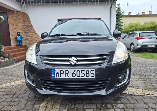 Suzuki Swift cena 34700 przebieg: 100200, rok produkcji 2015 z Żychlin małe 326